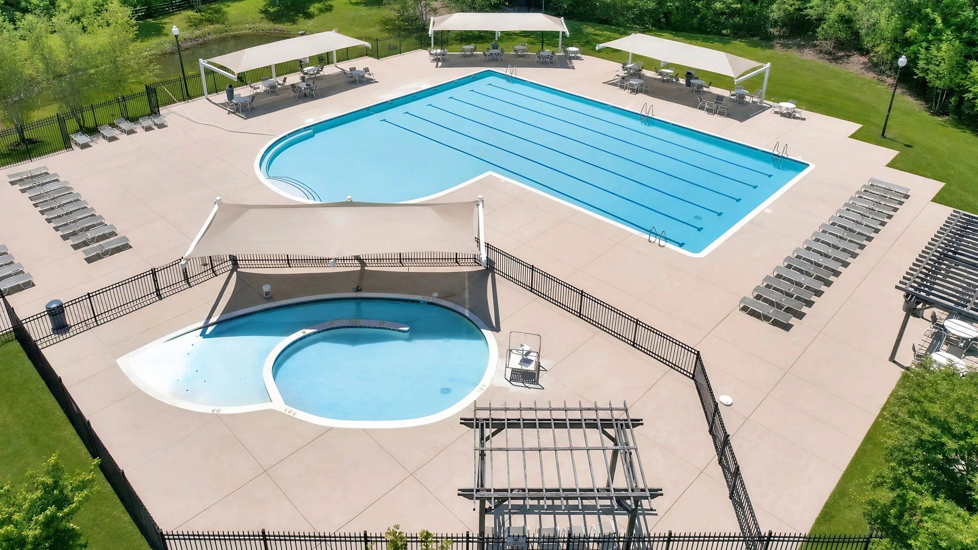 Aerial of swimming pool with lap lanes and mini pool