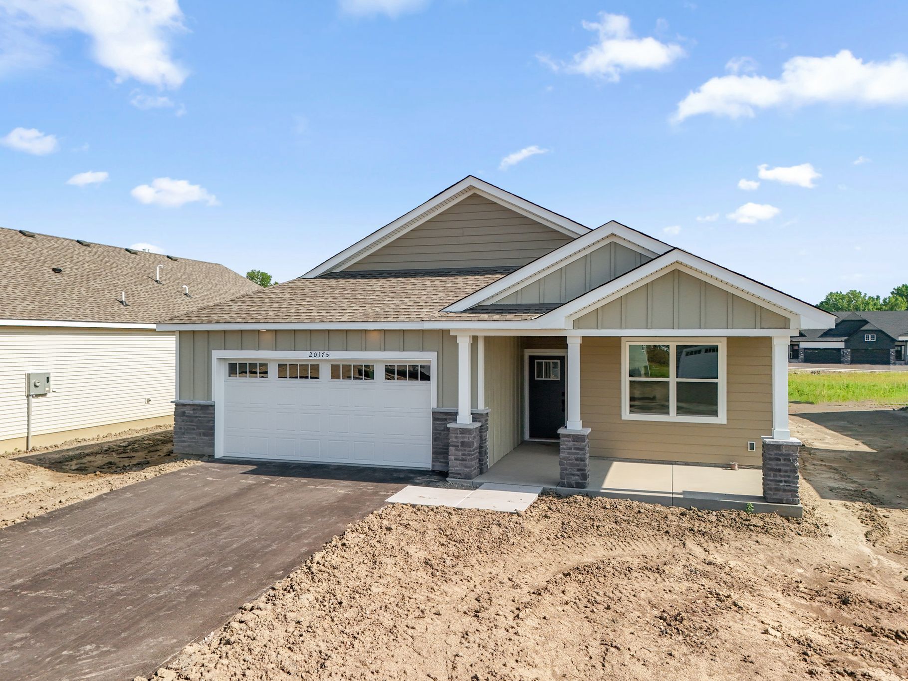 2 Tavera Brighton QMI H S7406 Front Yard 1of2 F1