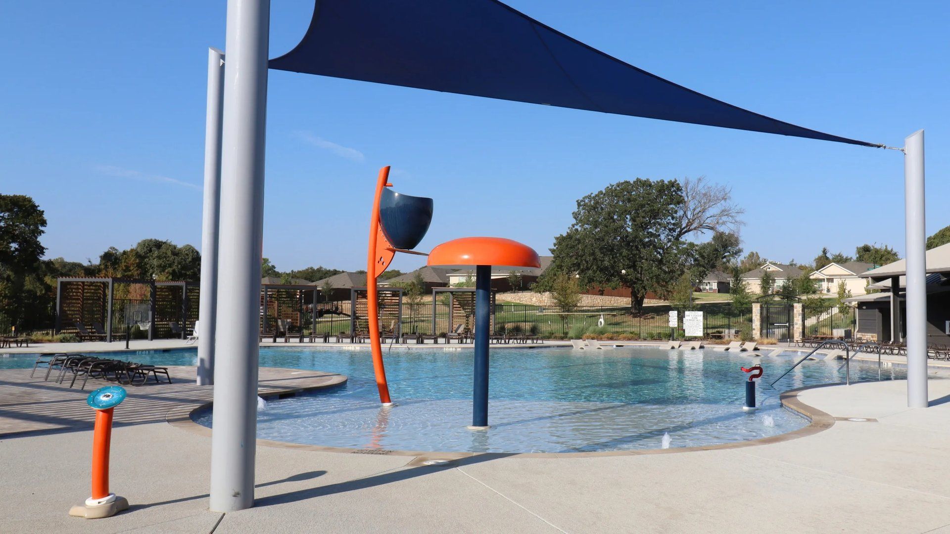 Splash pad with water features
