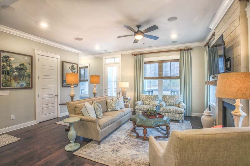 An open floor plan, the living room of The Seabrook model home connects to the kitchen and dining.