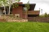 casa en Living Home Construction & Design por Living Home Construction & Design