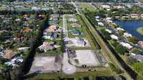 Flamingo Ranch Estates por Lowell Homes en Broward County-Ft. Lauderdale Florida