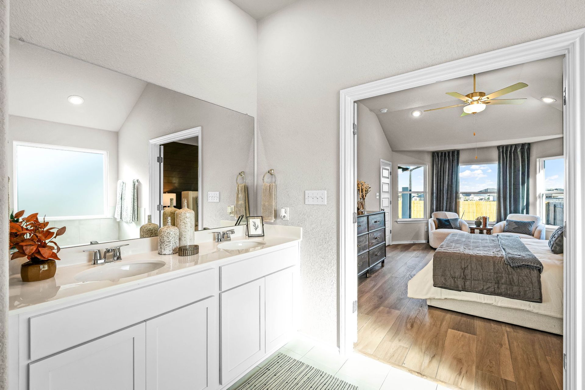 This is the primary bathroom of the Hawkins plan and is the model home in Carillon at 13305 Eppri...