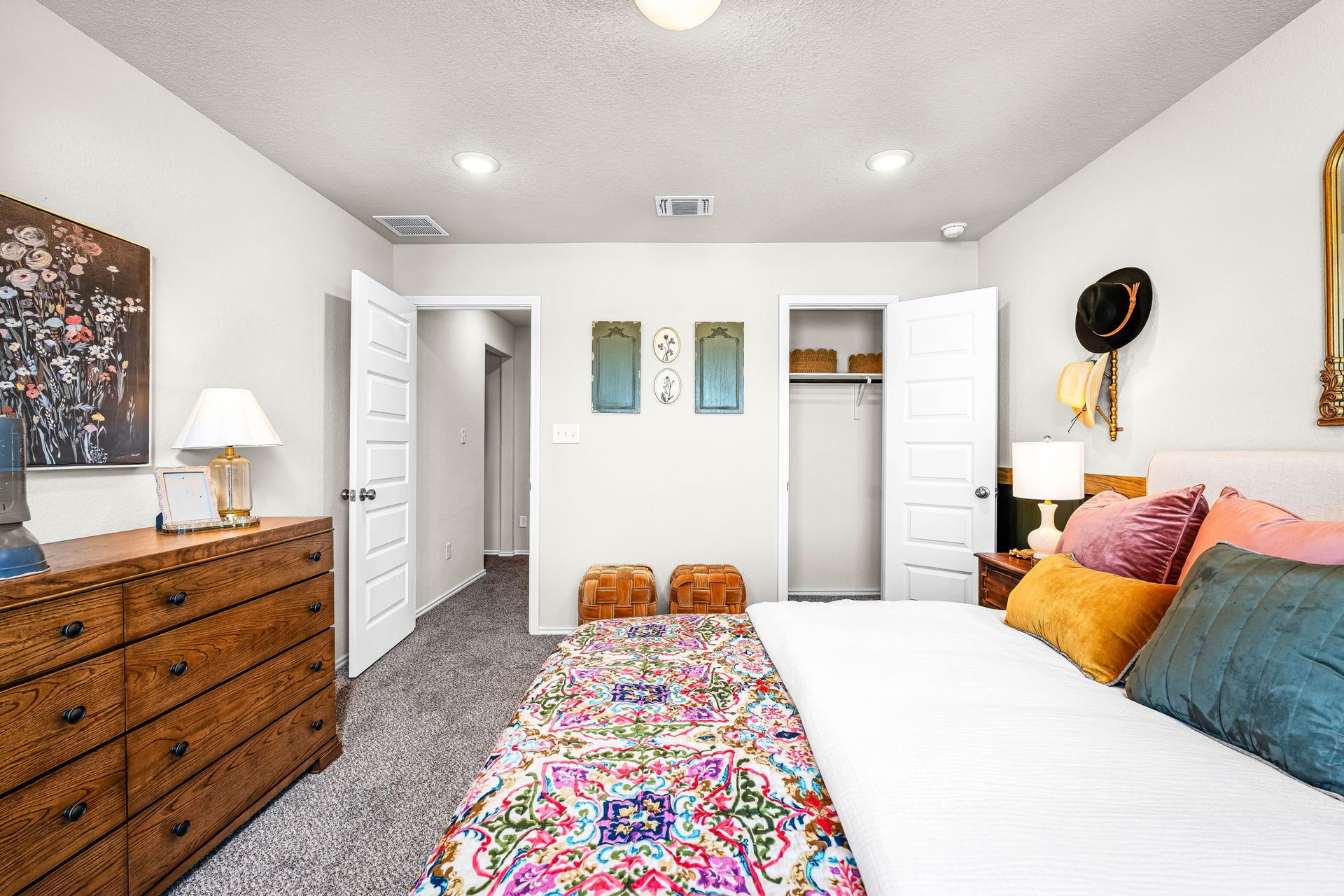 These are the secondary bedrooms of the Hawkins plan and is the model home in Carillon at 13305 E...