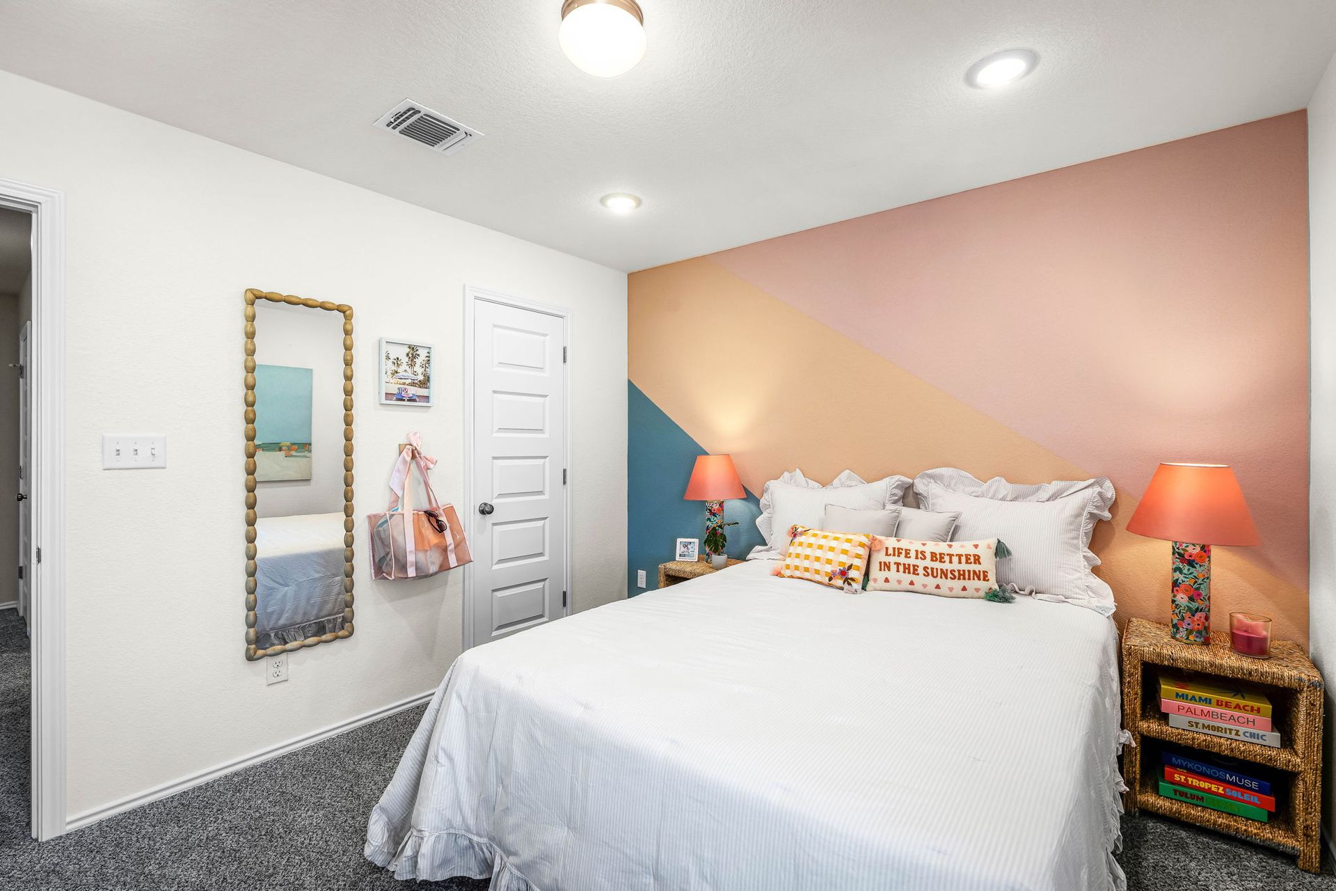These are the secondary bedrooms of the Hawkins plan and is the model home in Carillon at 13305 E...