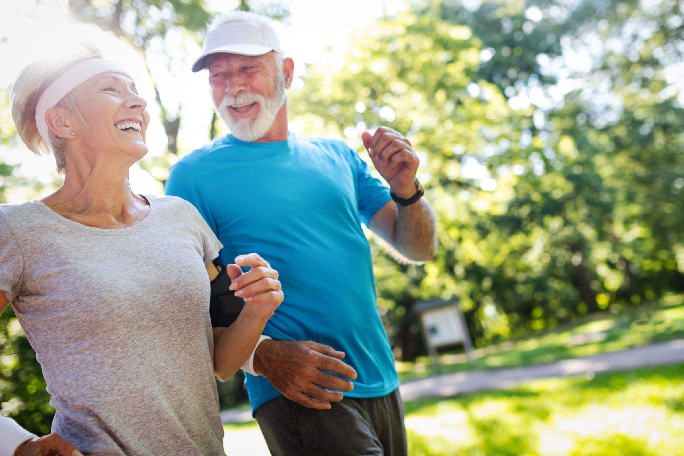 Senior couple jogging in a park
