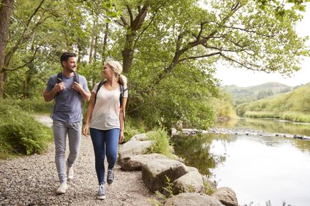 Couple hiking along a trail