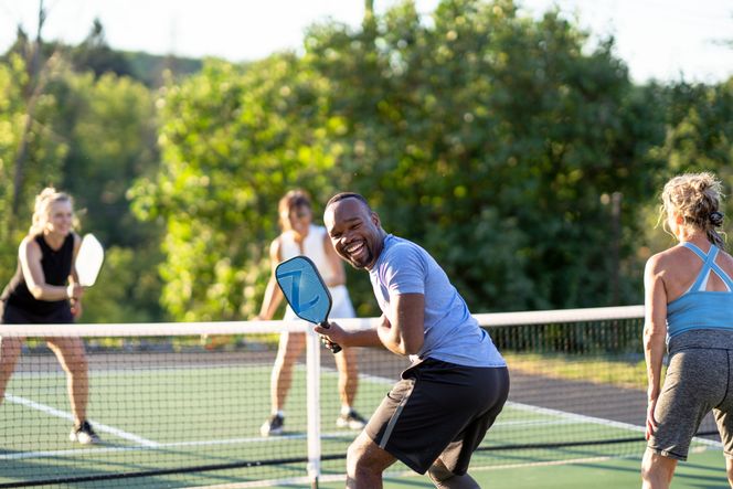 People Playing Pickleball on Court
