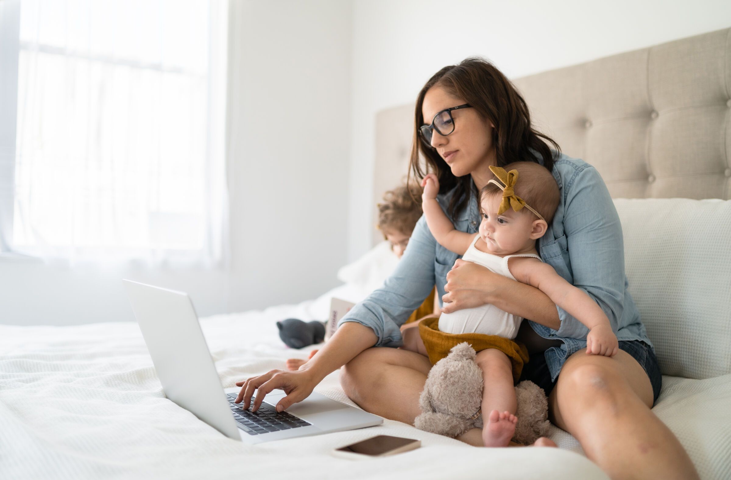 Mother and Children on bed
