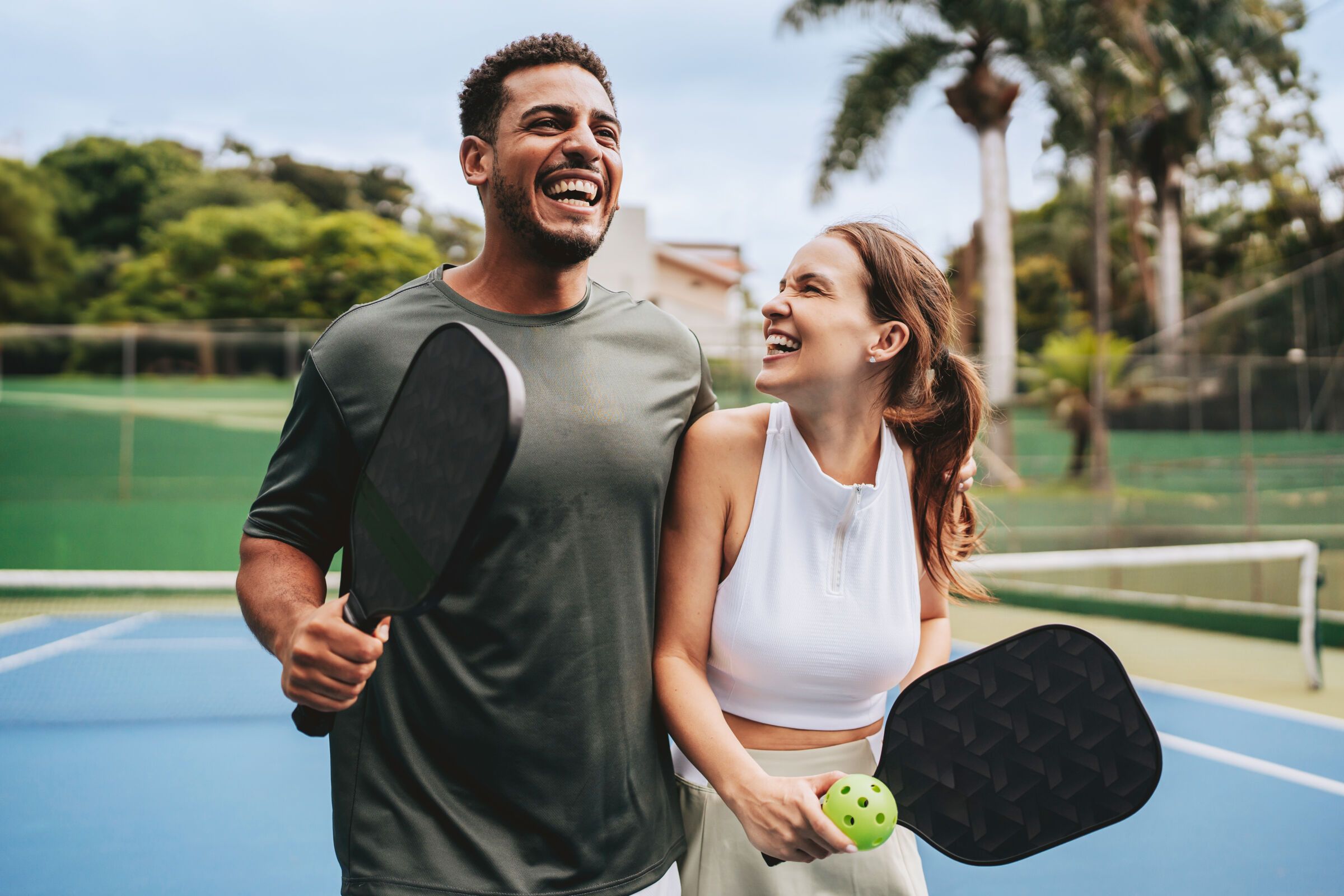 Life's better with a paddle in hand and a friend across the net.