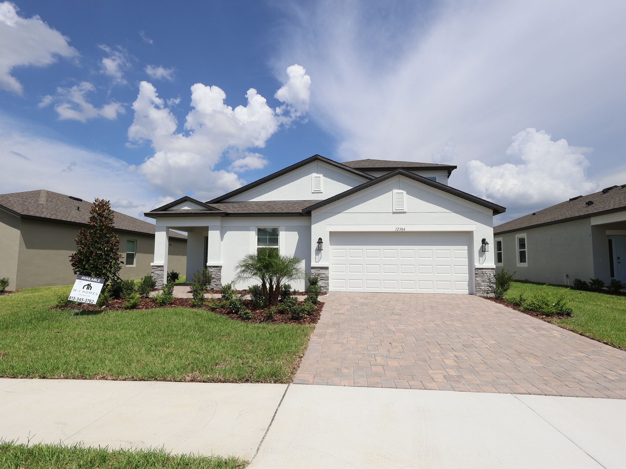 Elmhurst Bonus - Hilltop Point: Dade City, Florida - M/I Homes