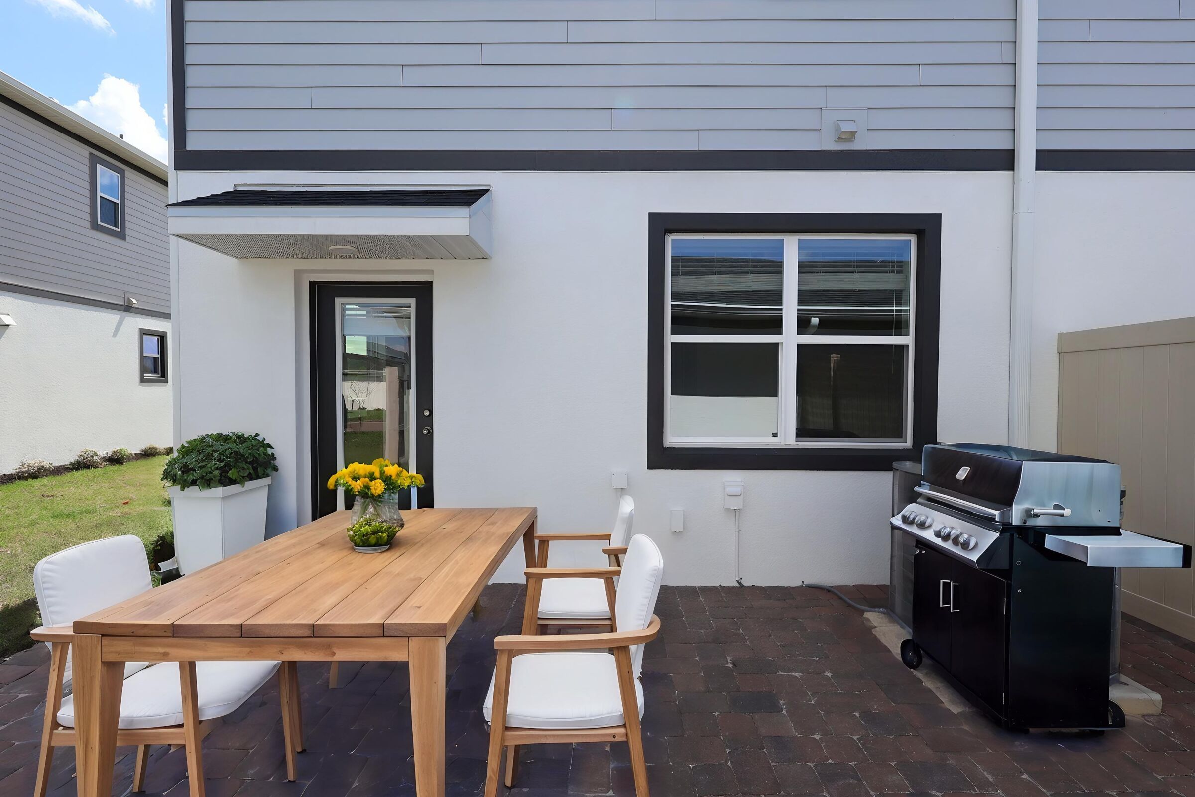Townhome Courtyard - Representational Photo