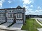casa en Green Level Trail Townhomes por M/I Homes