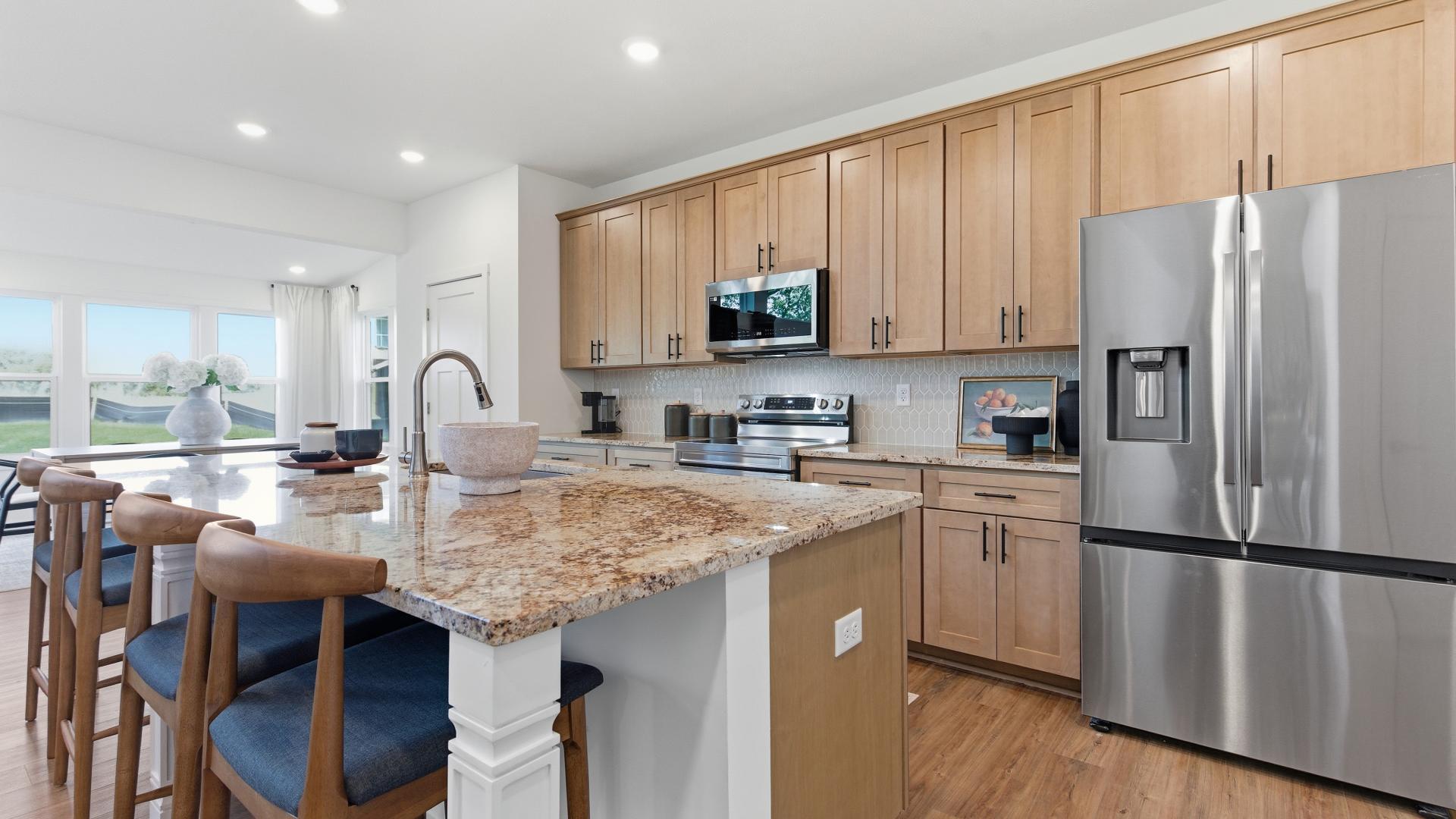 Contact us and ask about the beautiful chef kitchen available on select home designs.