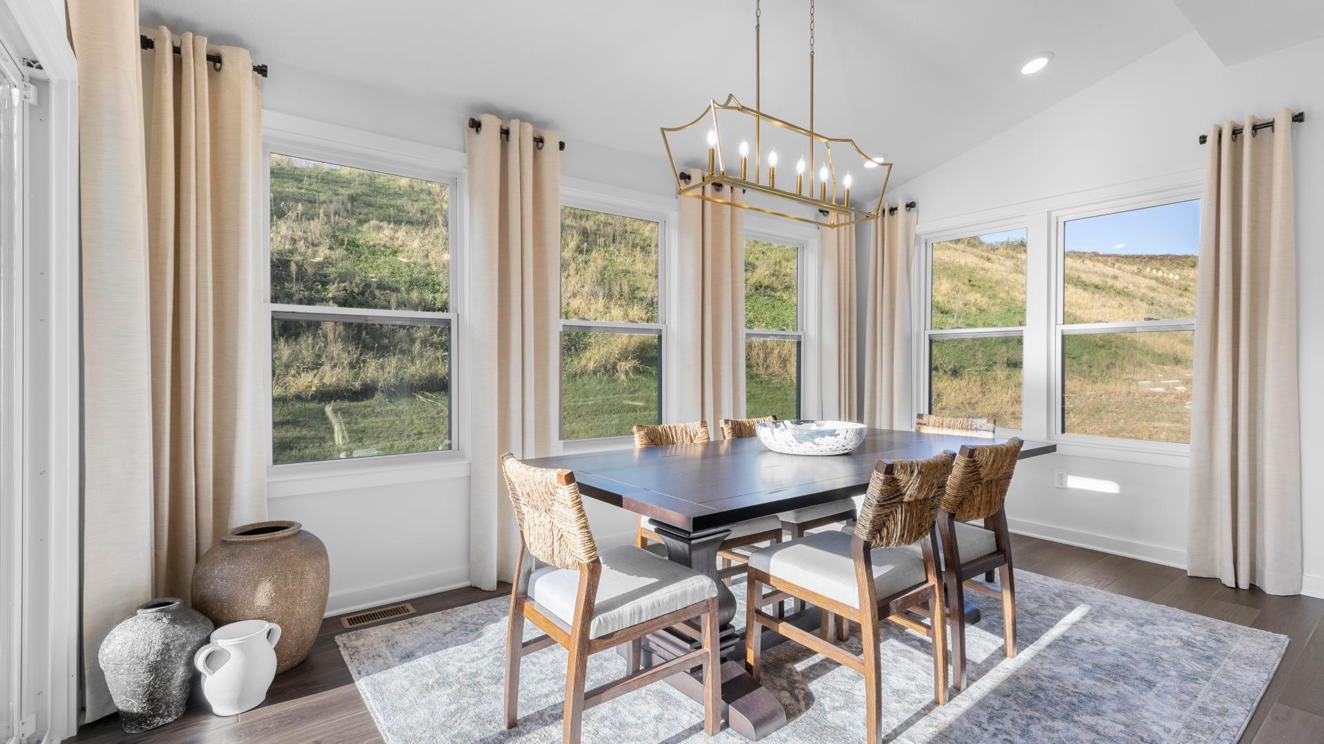 A sunroom makes the perfect dining space or create a reading nook &amp; curl up with a glass of wine.