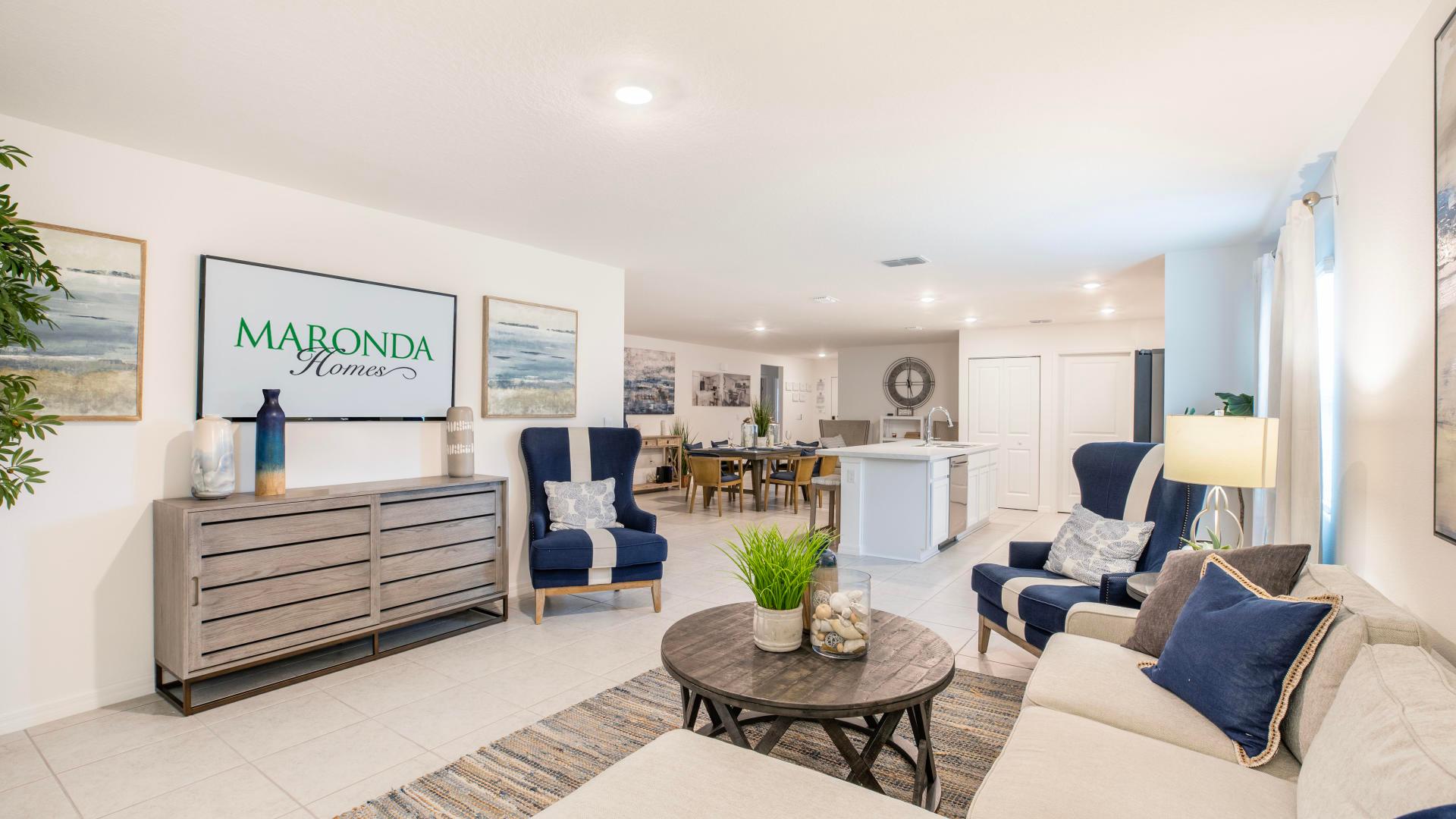 Living room seamlessly blends with the kitchen and dining area—ideal for hosting gatherings.