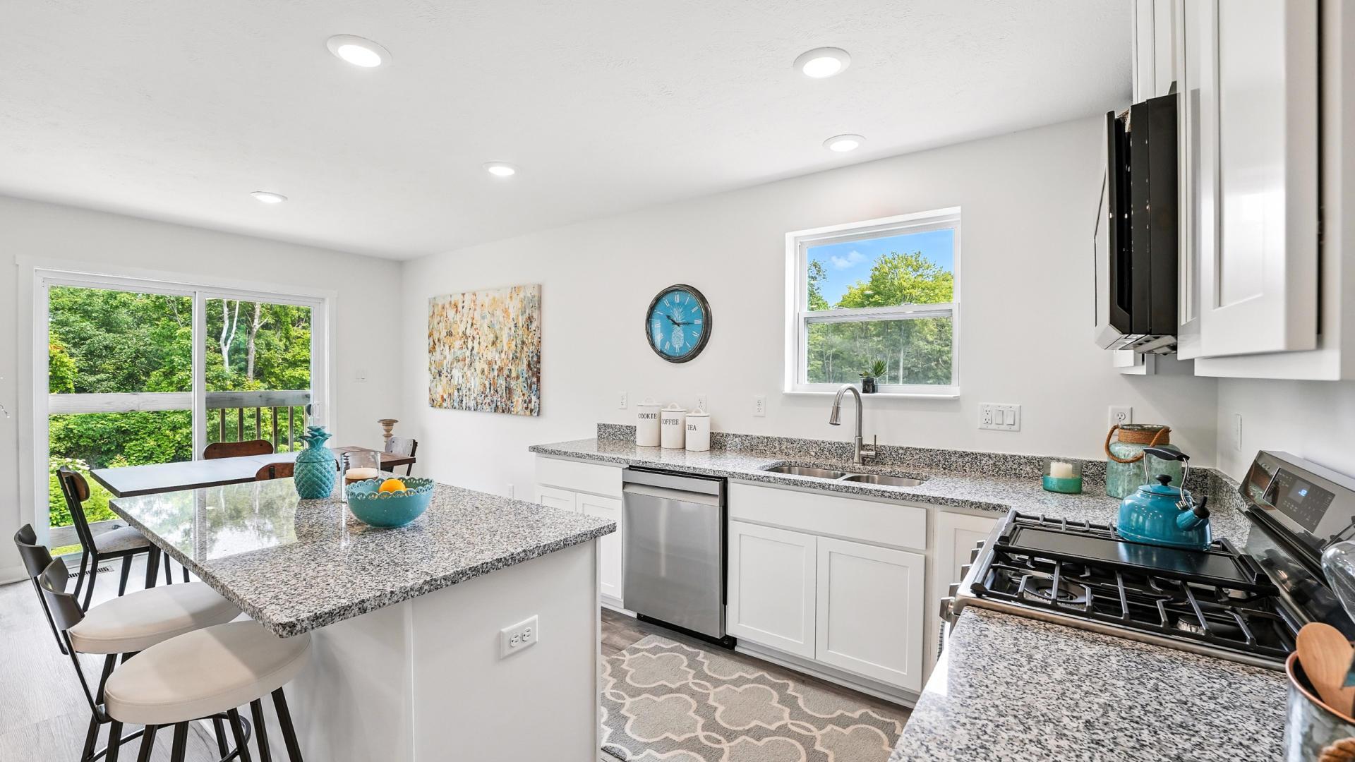 Yes, we include that – designer countertops, dishwasher, range and LVP flooring.