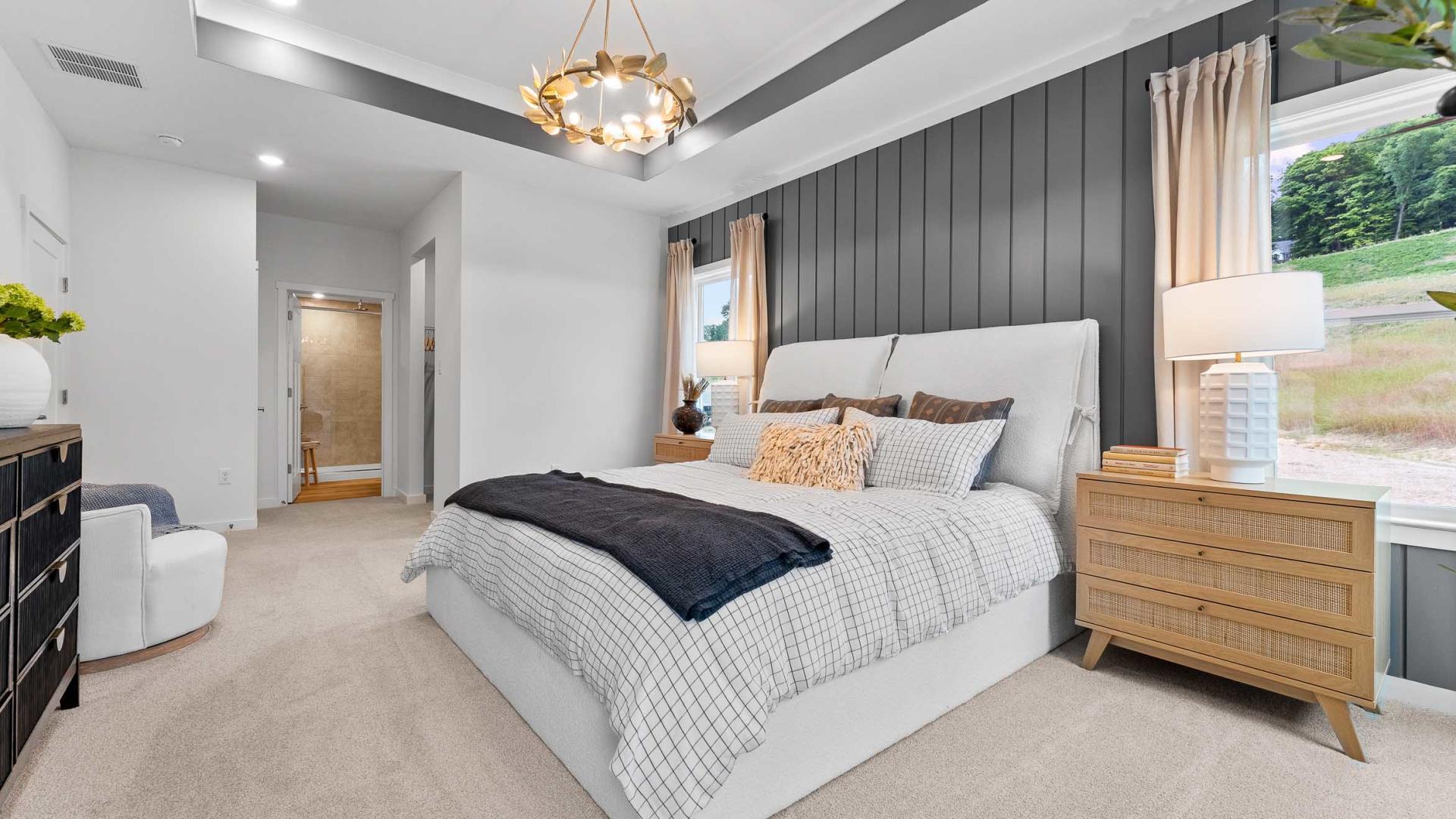 Luxurious master suites with spacious, walk-in closets are included.