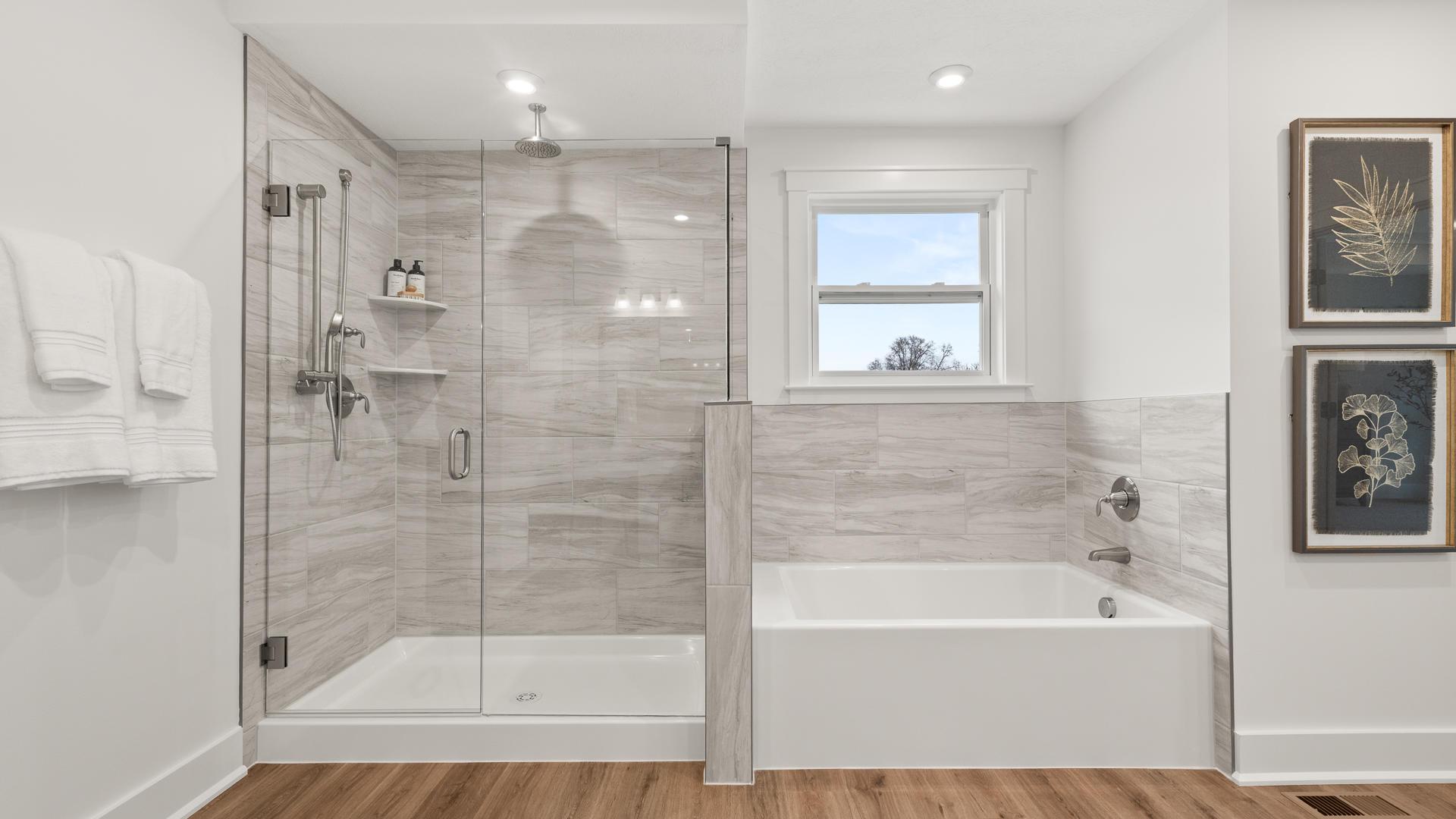 ...double vanities, shower, soak tub, walk-in closet, and more!