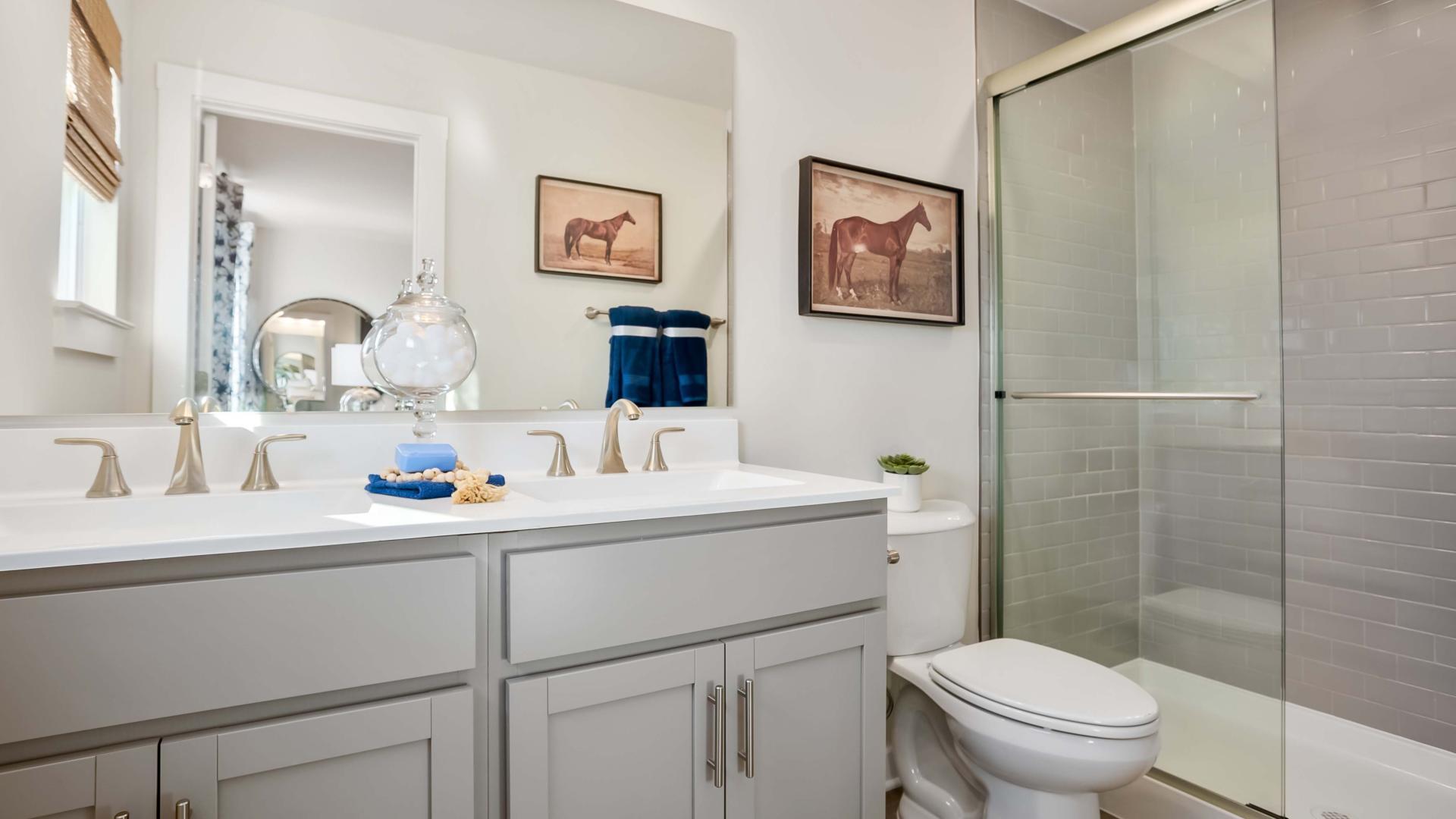 St. Paul is perfect for roommates: 3.5 baths, dual vanities, and easy-to-maintain bathrooms.
