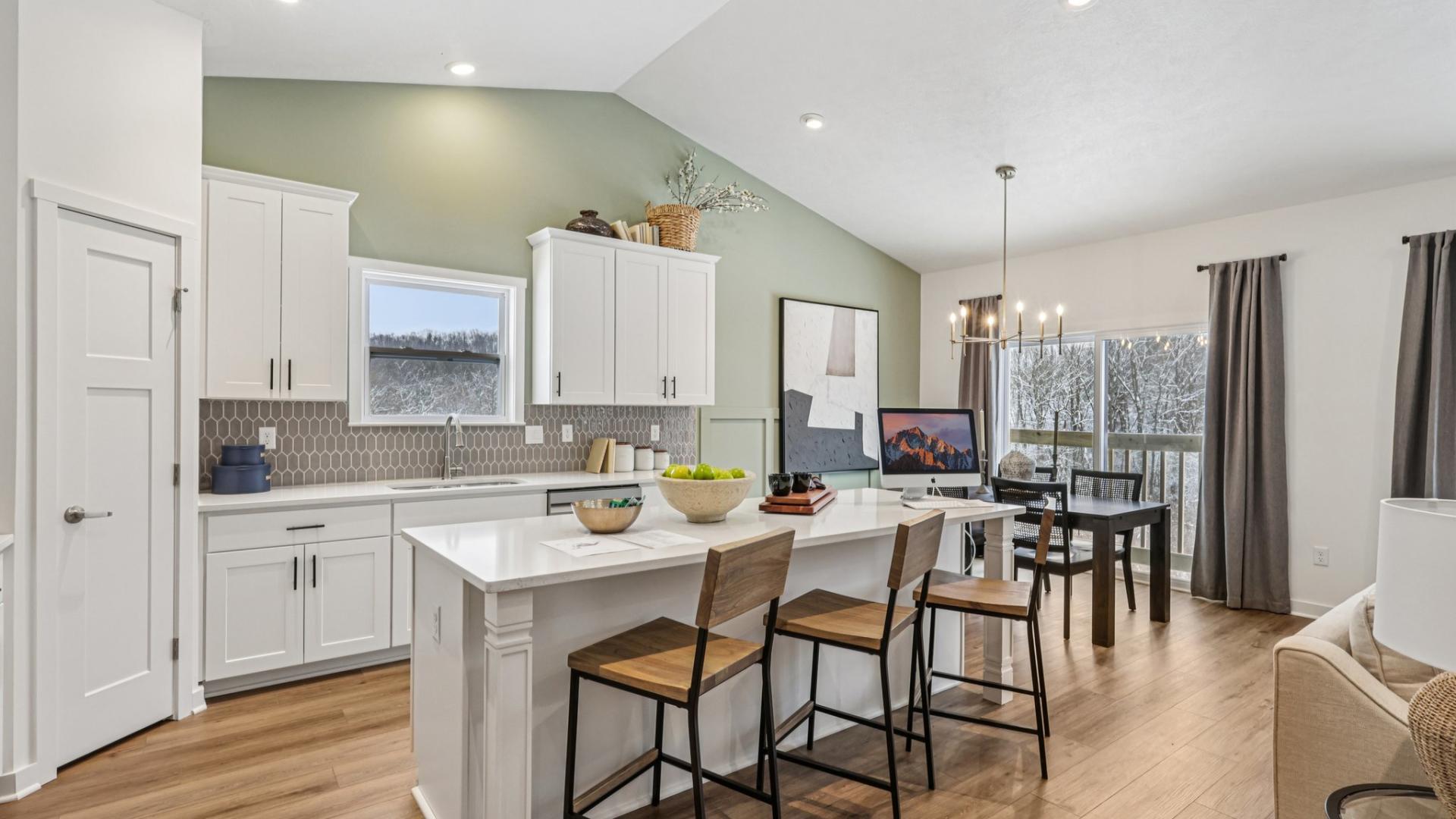 Your new kitchen has it all - Granite countertops, LVP flooring, and stainless steel appliances.