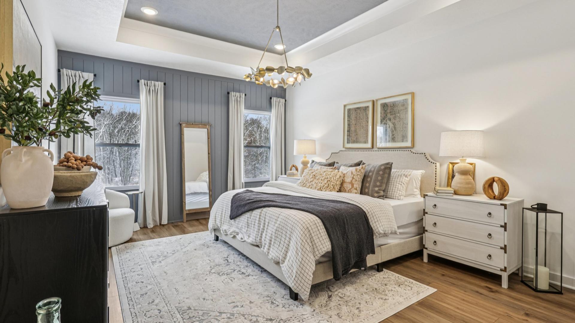 Luxurious master suites with spacious, walk-in closets are included.