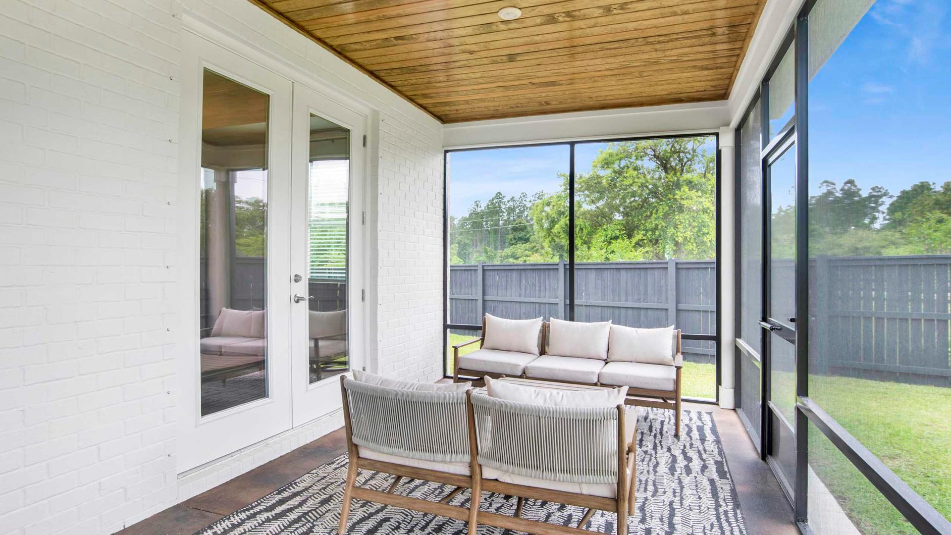Have morning coffee out in your sunroom and take in the views of your private backyard.