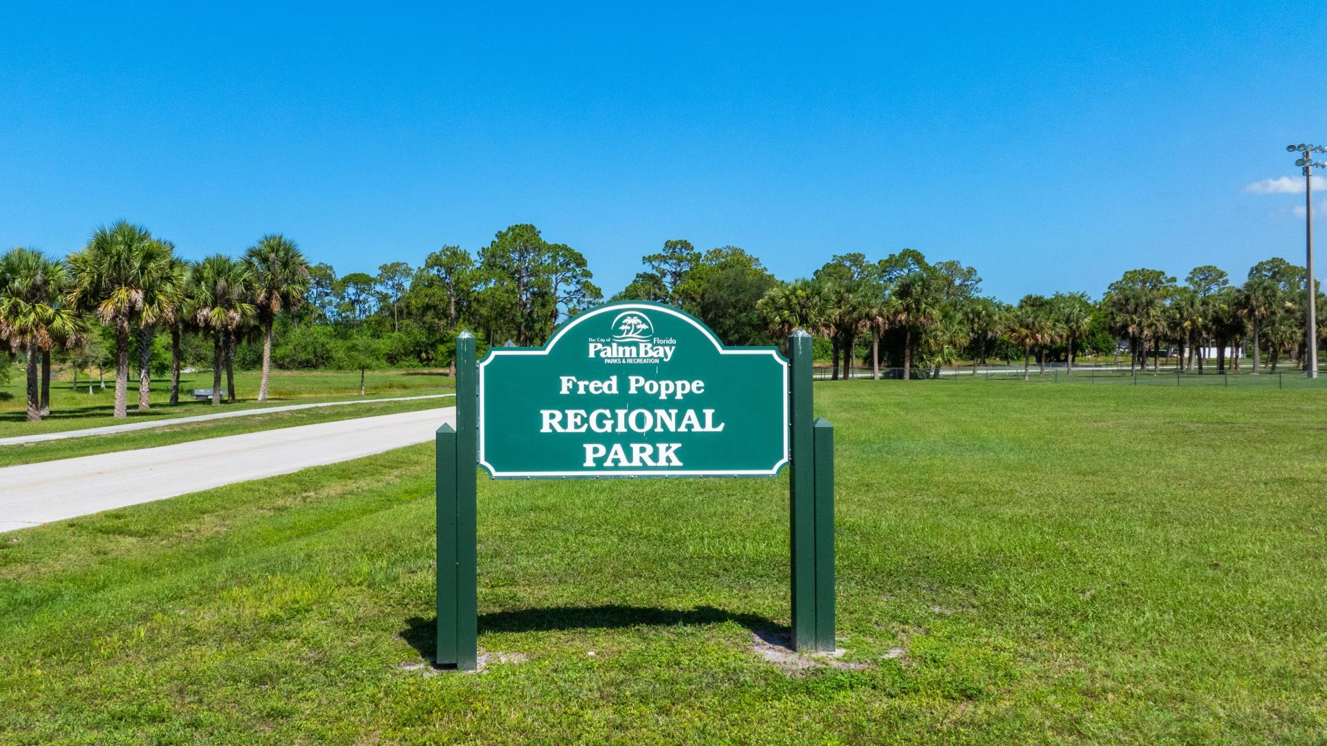 Fred Poppe Park, just 2.6 miles away: Play, explore, and unwind with trails, fields, and a dog park!