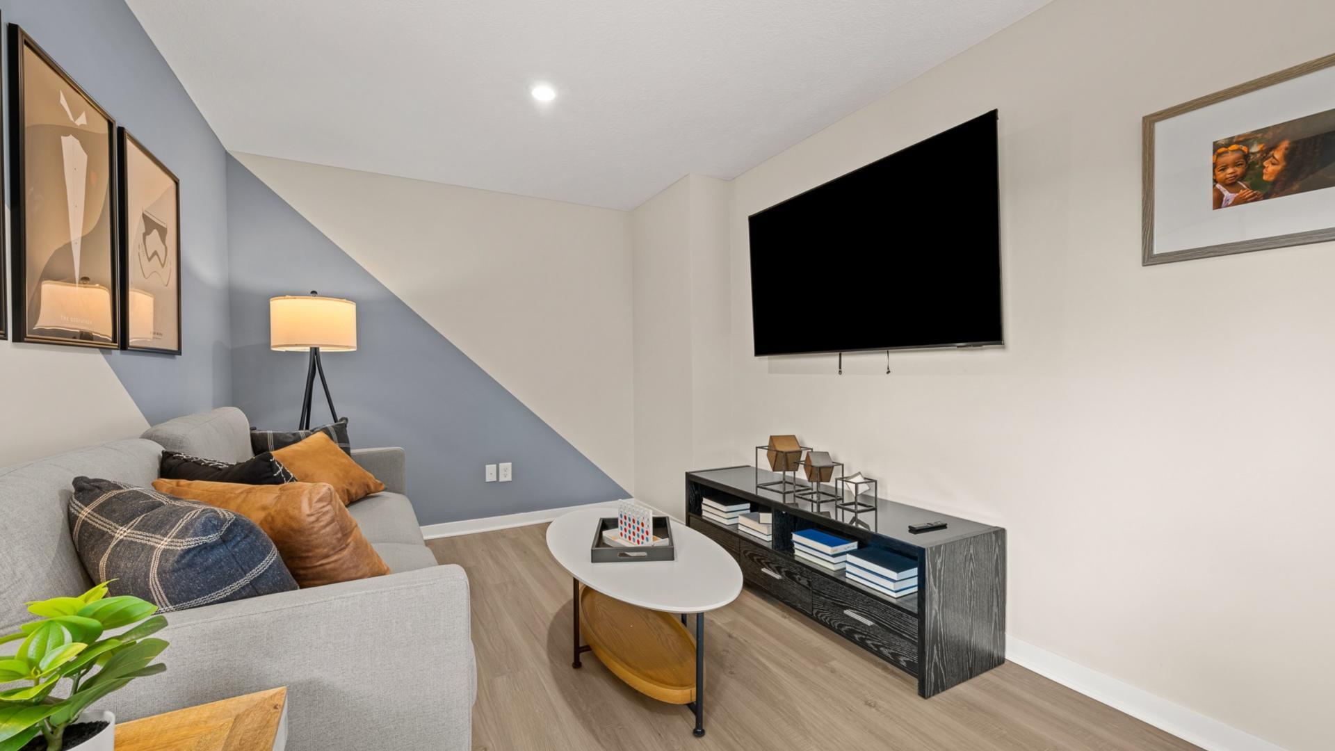 Finished lower level gives you more living space to spread out.