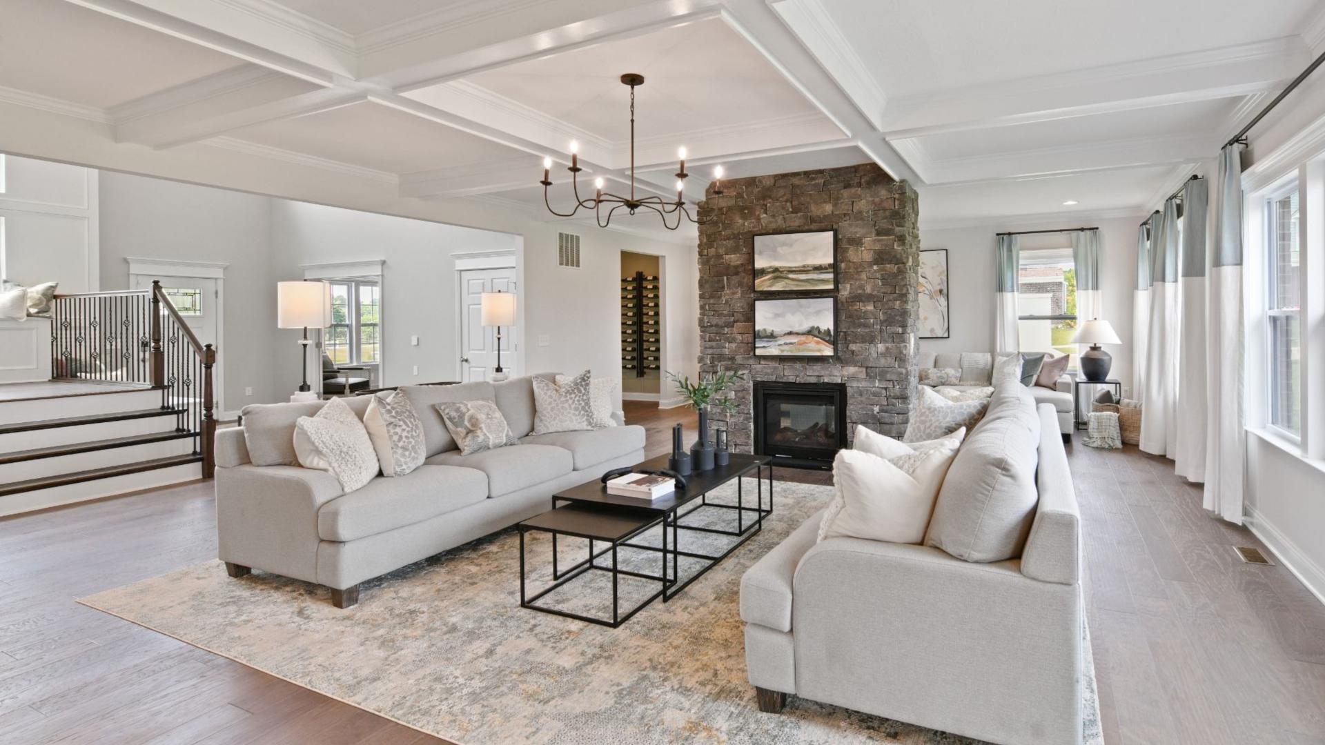 Stone 2-sided fireplaces, coffered ceilings, built-in bookcases – all available for you to personalize.