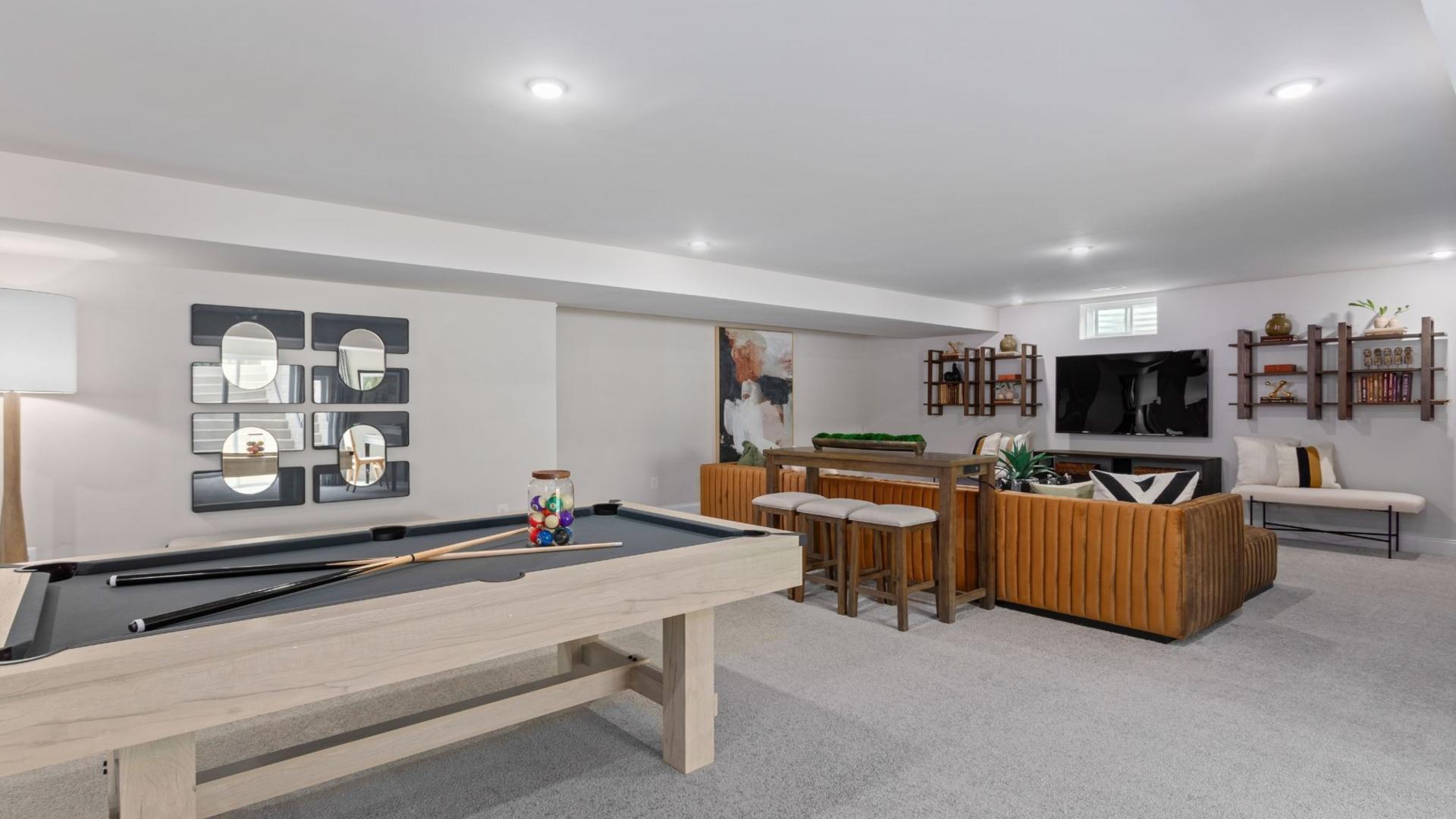 Have space for a home theater, gym, pool table and a wet bar with a finished basement.