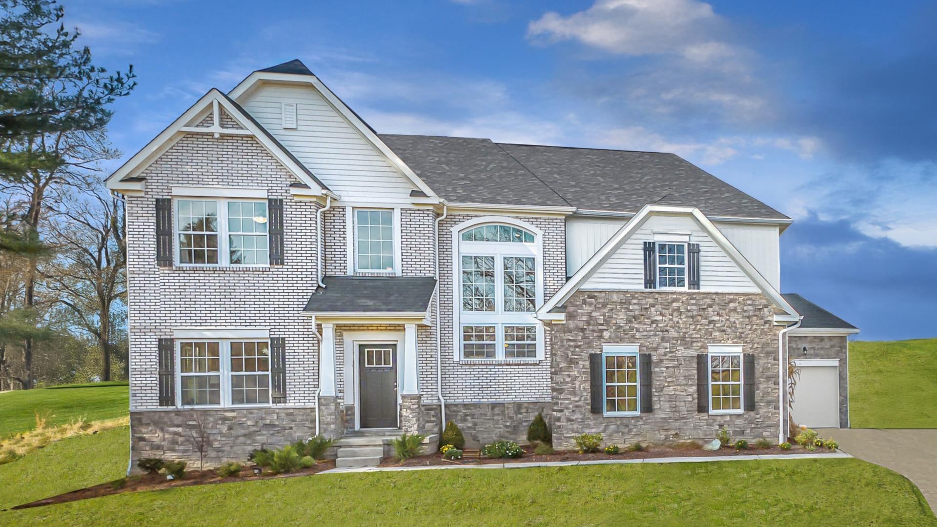 Hardie Plank siding, stone or brick accents &amp; side-entry garage create impressive curb appeal.