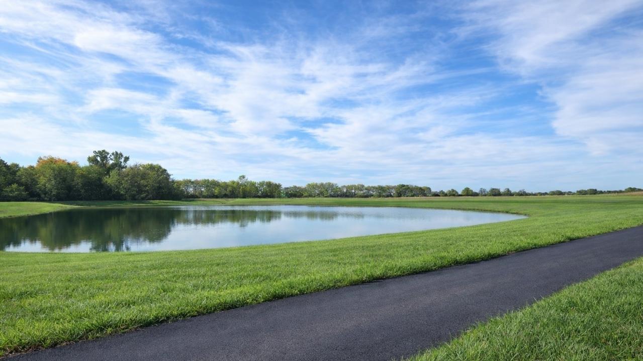Start your mornings with peaceful walks along the community walking trail, just steps from your front door.