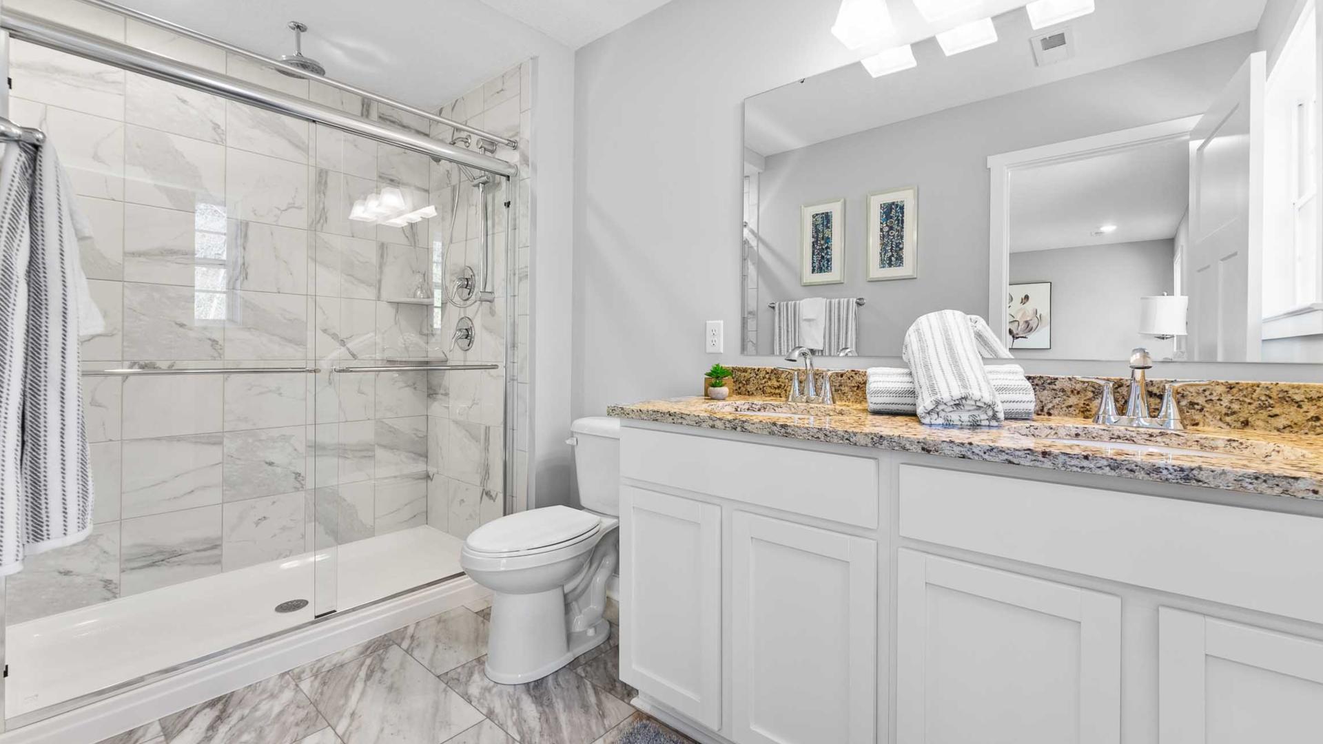 Your master bath has a walk-in shower and dual vanities making mornings easy.