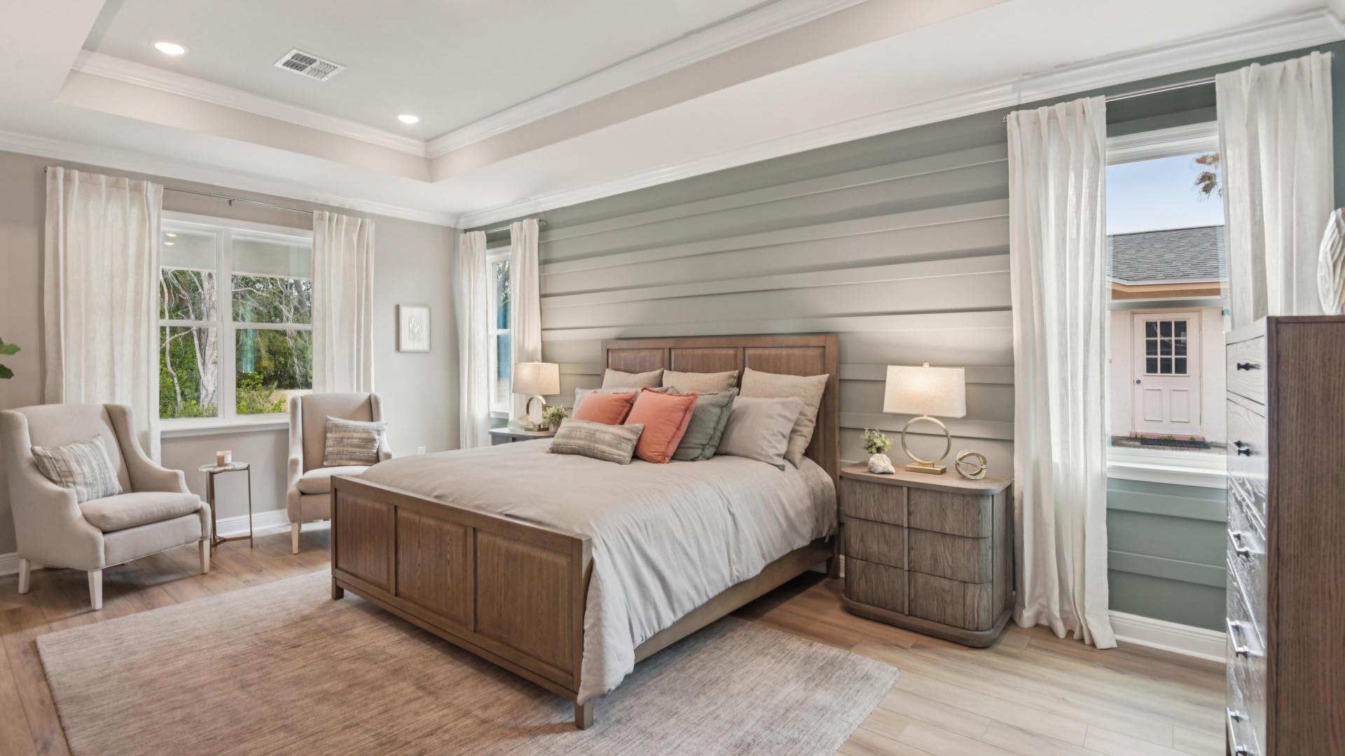 Master bedrooms with walk-in closets and modern bathrooms.