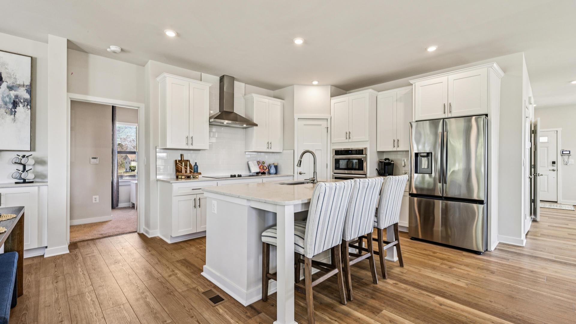 Luxury finishes include your choice of 3 cabinet colors, with quartz countertops and LVP flooring.