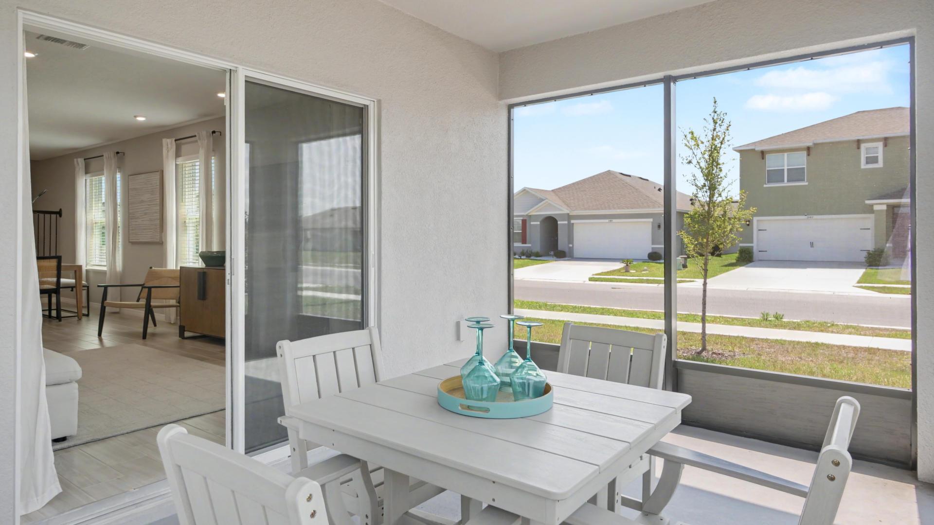 Enjoy your morning coffee on the screened-in lanai.
