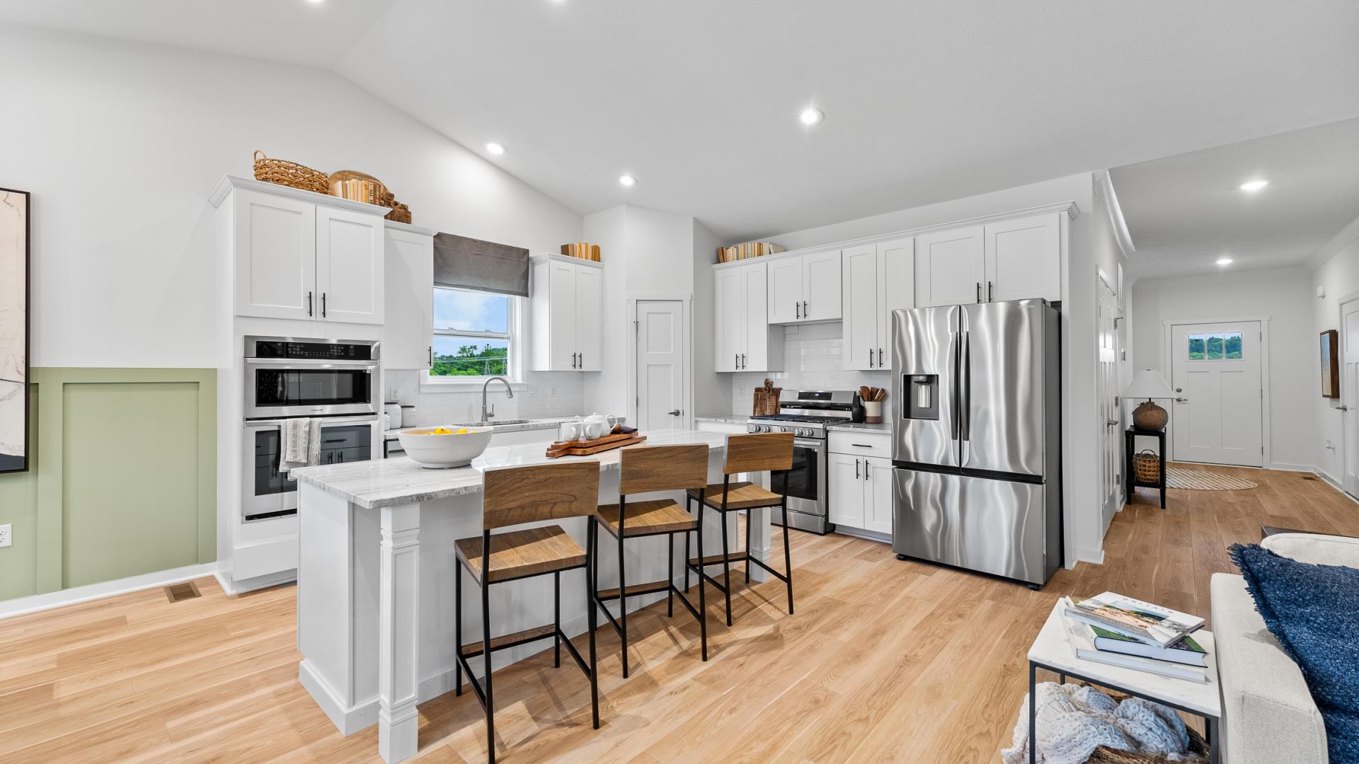 The luxury features you expect are included – LVP flooring, granite countertops and kitchen islands.