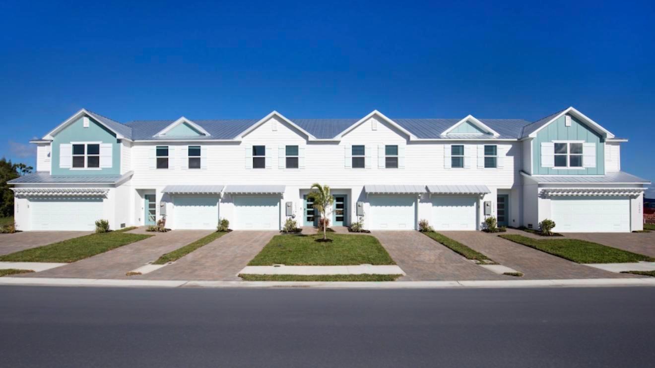 Bright, charming exteriors with metal roofs offer simple, low-maintenance living.