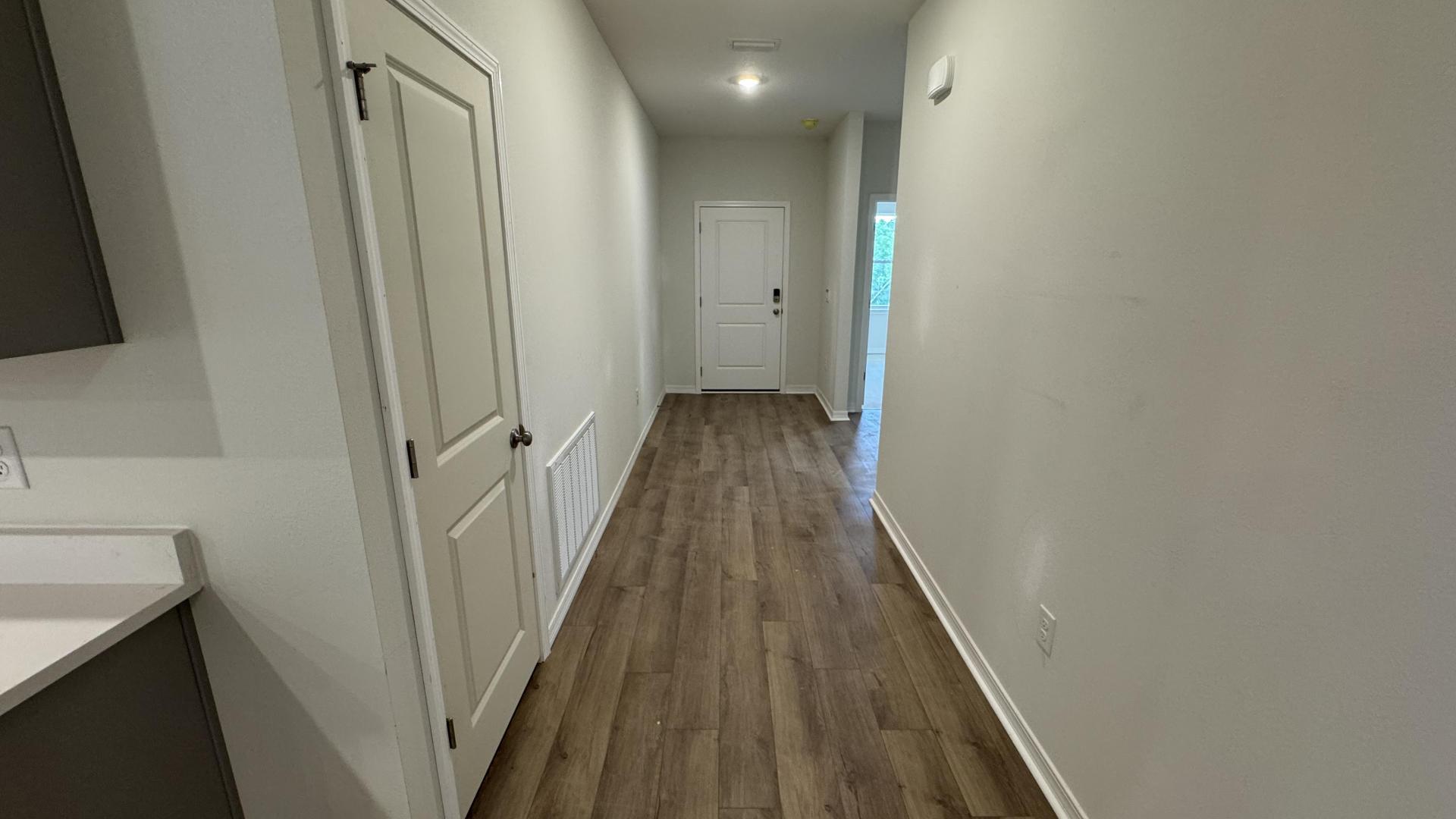 View of front entryway from kitchen