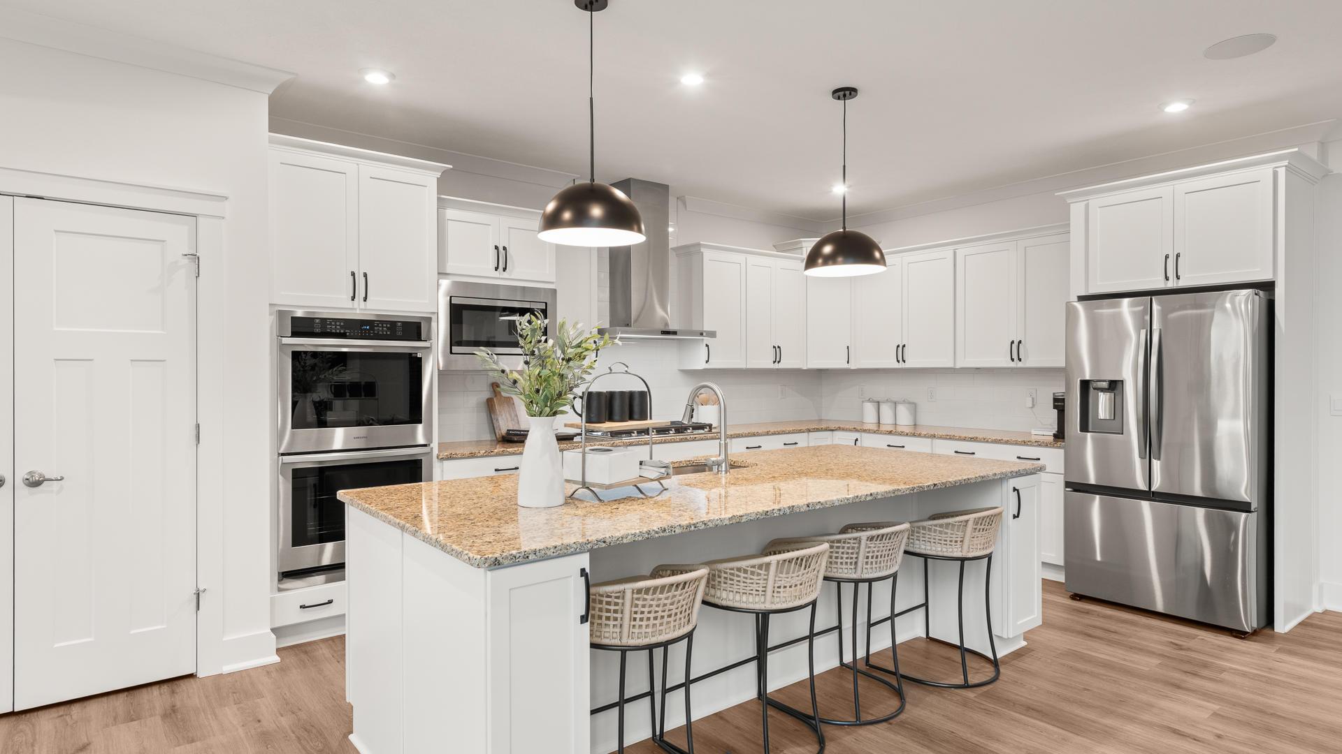 Your new kitchen will feature stainless steel appliances and a spacious island for cooking and entertaining.