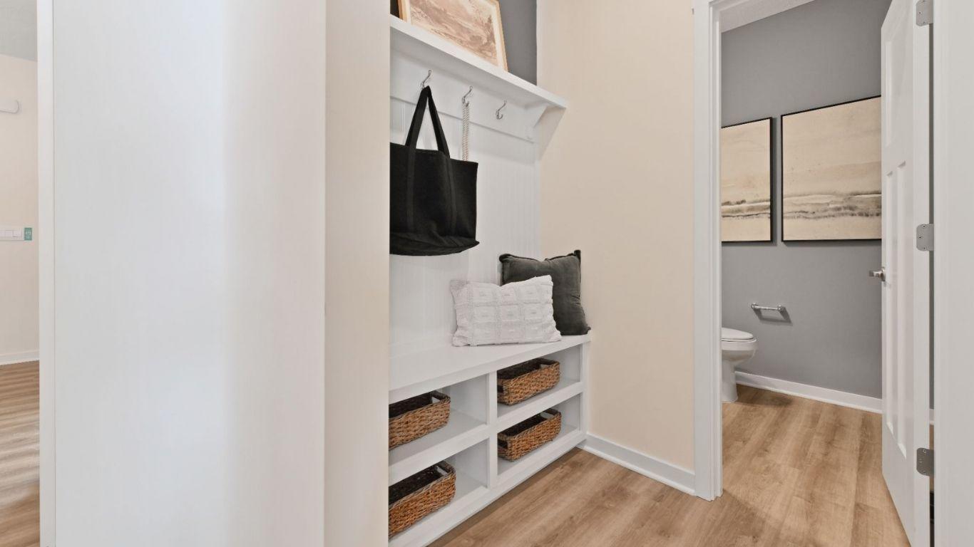 Select built-in storage to hang the coats, toss the shoes and leave the bookbags.