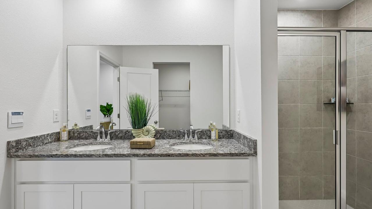 Start and end your day stress-free with enough bathrooms and double vanities.