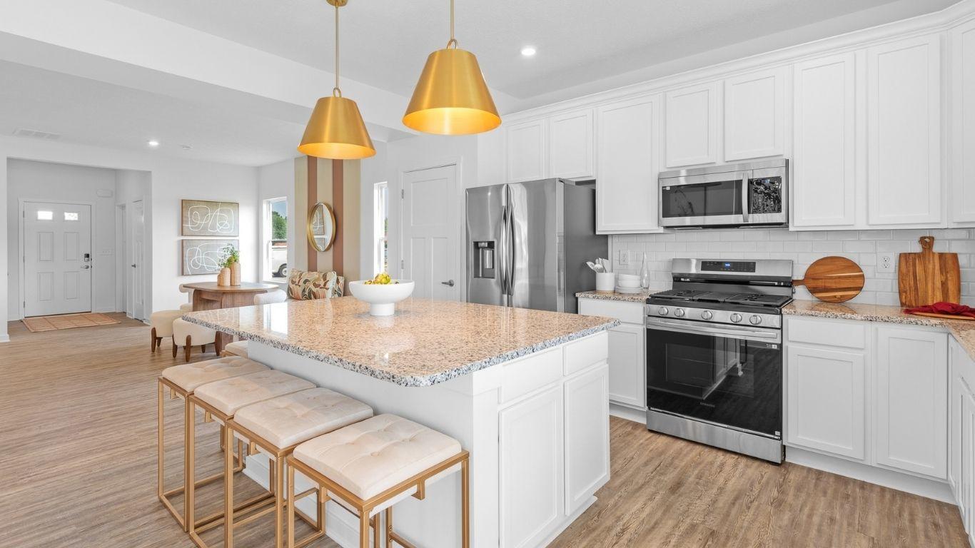 Easy to maintain quartz countertops, LVP flooring, and stainless steel appliances included!