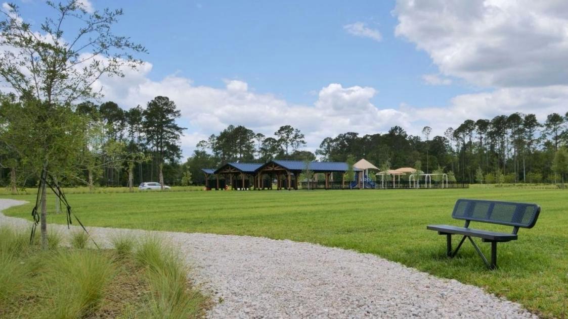 Gather, play, and connect: Playground, pavilions, benches, &amp; recreational green space.