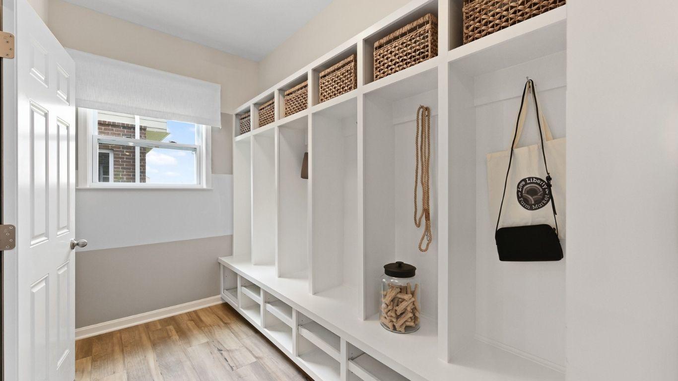 Coats, bookbags, and shoes are easy to organize when you choose to personalize your home with built-in lockers.
