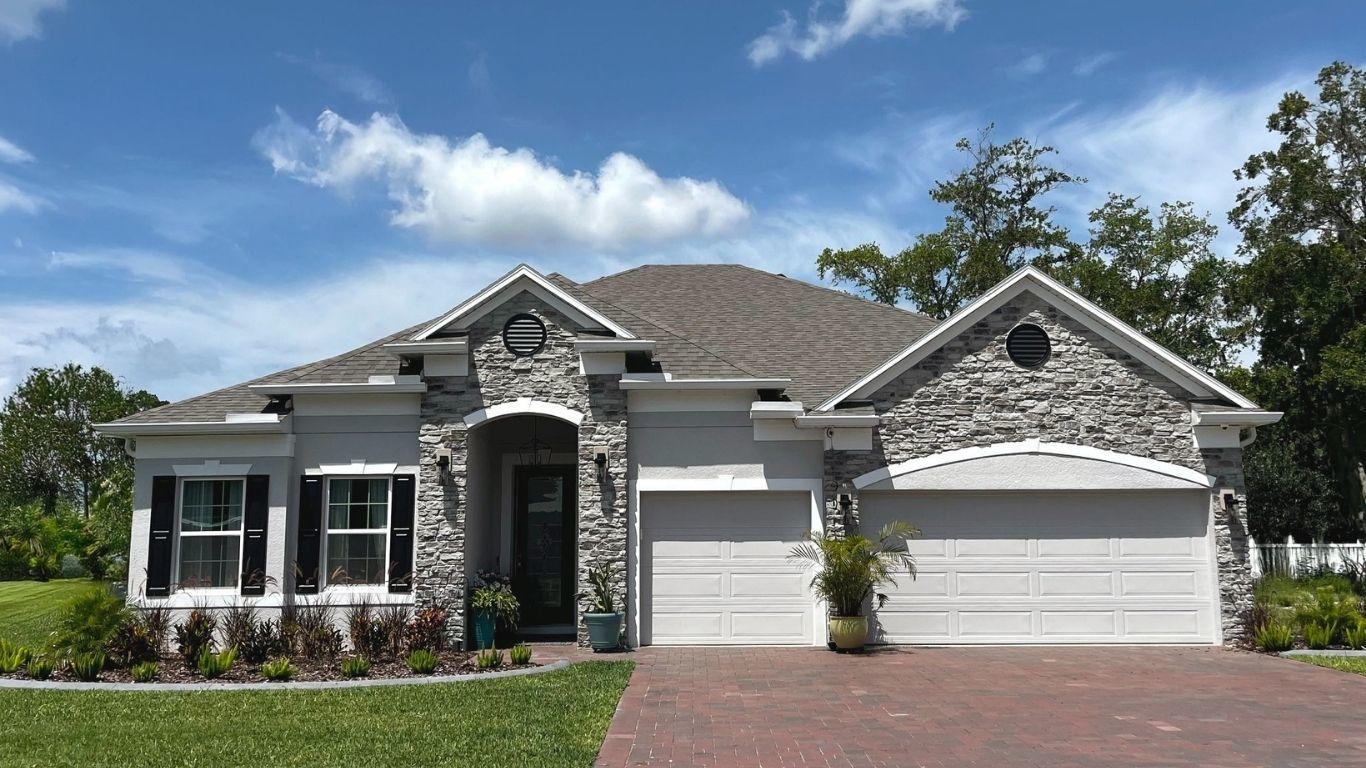 Block construction &amp; up to a 3-car garage offers additional storage space.