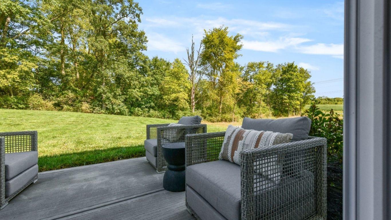 A patio and wooded views make the perfect spot for Saturday morning coffee.