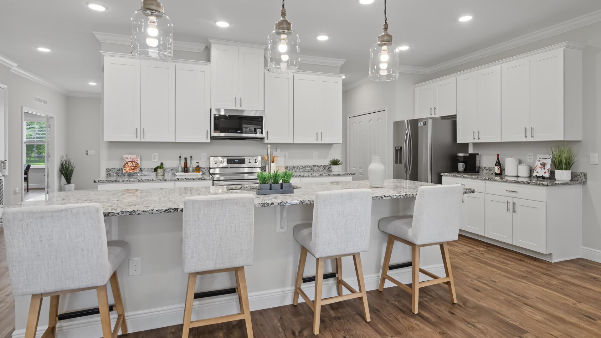 Your new kitchen will feature stainless steel appliances and a spacious island for cooking and entertaining.