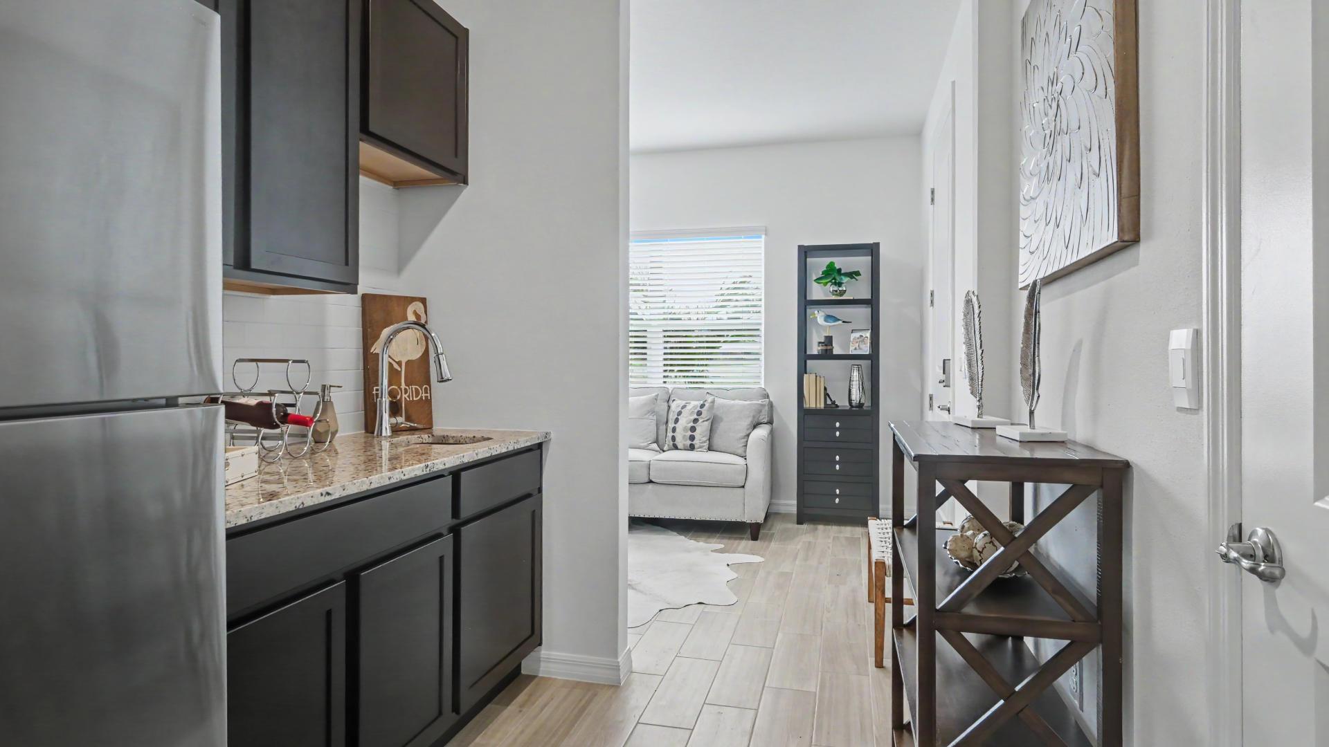 Multi-gen design with separate entry &amp; kitchenette for parents, kids, guests, or home offices.